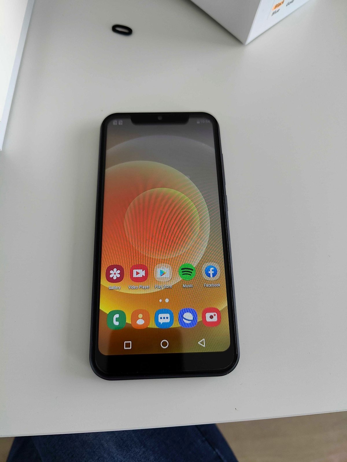 MaxPhone home screen on a large display with a notch at the top